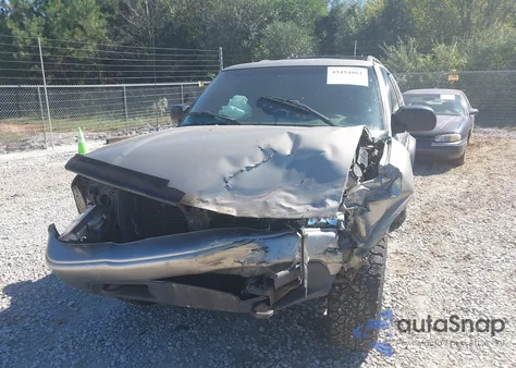 2000 GMC Jimmy Sls Convenience from USA, damaged, VIN 1GKCT18W5YK272809